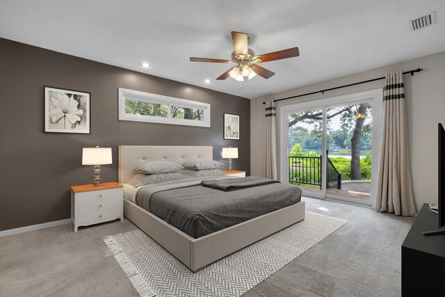 6557 Alan A Dale Trl, Leon, FL 32309 - bedroom with light colored carpet, access to exterior, recessed lighting, a ceiling fan, and baseboards