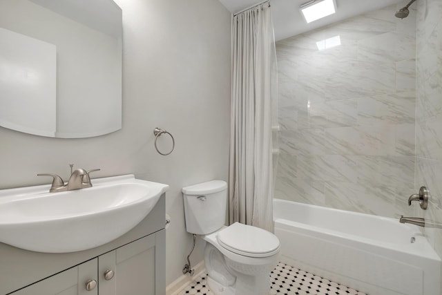 6557 Alan A Dale Trl, Leon, FL 32309 - bathroom featuring shower / bath combo, vanity, toilet, and baseboards