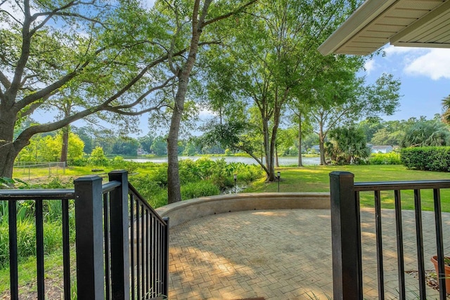 6557 Alan A Dale Trl, Leon, FL 32309 - view of green lawn with a water view and view of scattered trees