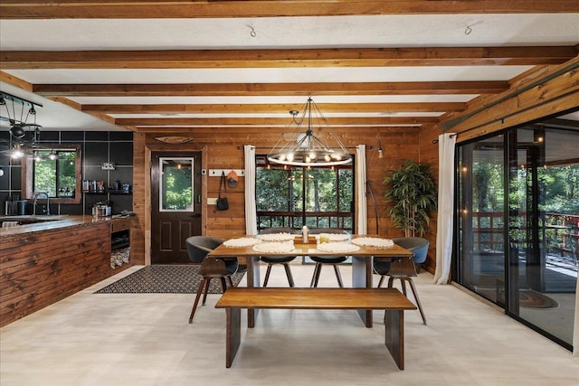 436 Tharpe Cir, Quincy, FL 32351 - dining room featuring beamed ceiling and wooden walls