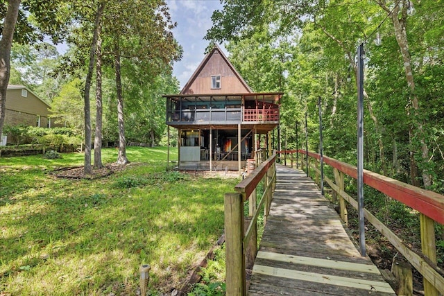 436 Tharpe Cir, Quincy, FL 32351 - back of property with a yard and a wooden deck