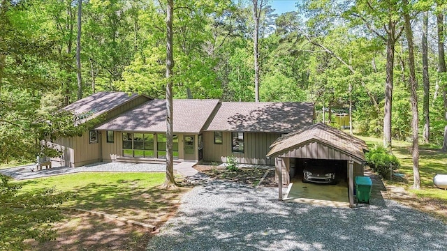 view of front of home featuring roof with shingles