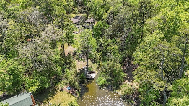 aerial view featuring a wooded view