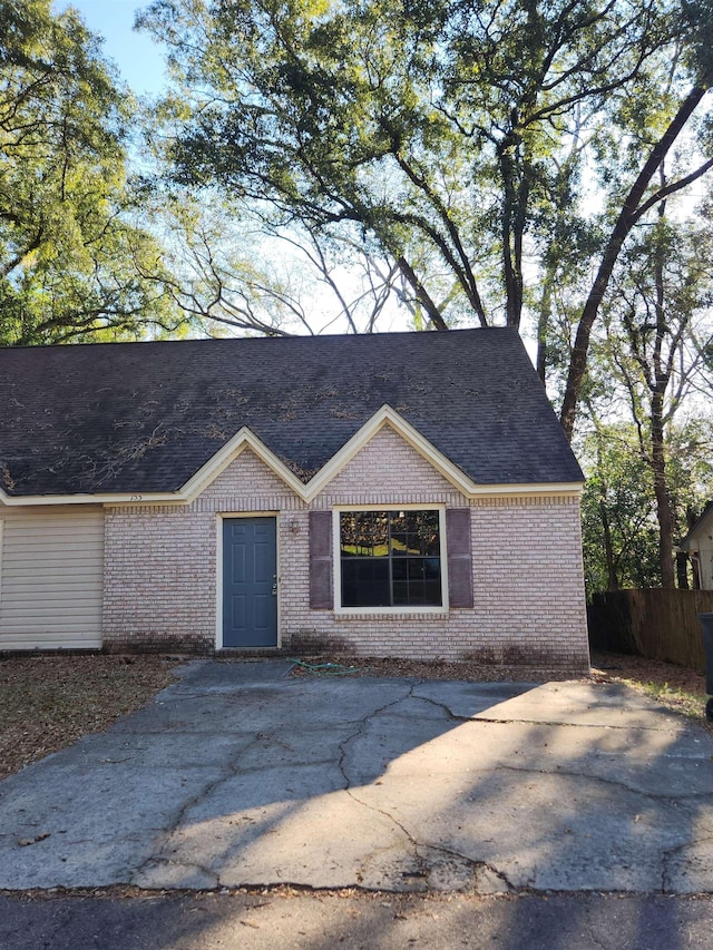 single story home featuring a patio