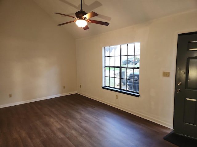 interior space with ceiling fan, lofted ceiling, and dark hardwood / wood-style flooring