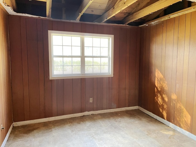 empty room with wooden walls