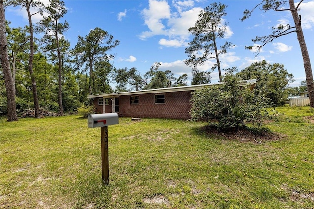 exterior space featuring a front yard