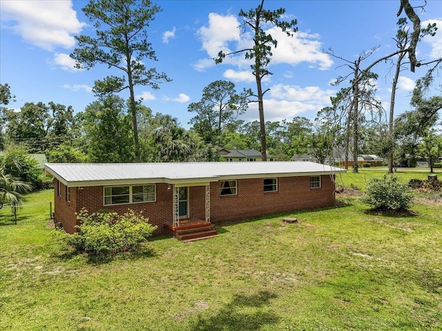 view of front of house with a front lawn