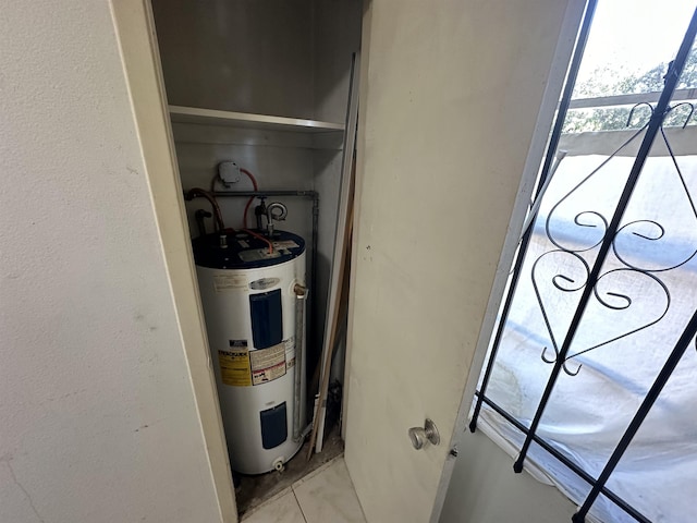 utility room with water heater