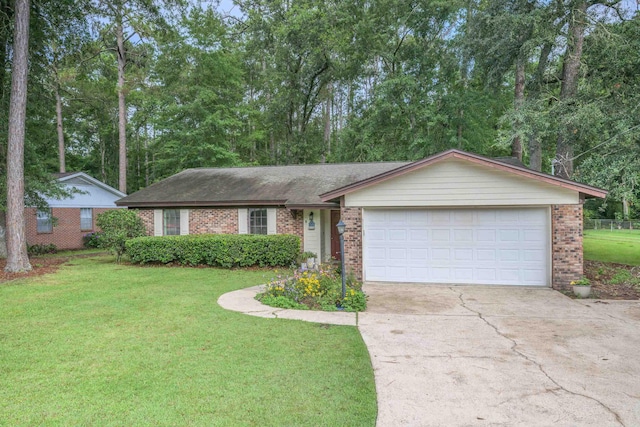 4308 Snoopy Ln, Tallahassee, FL 32303 - ranch-style home featuring brick siding, concrete driveway, a front lawn, and a garage