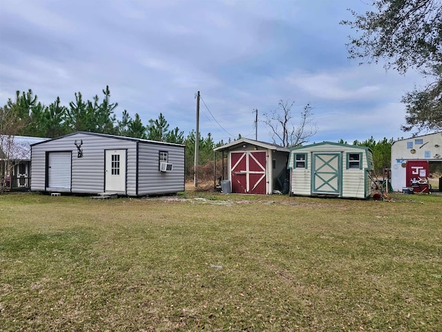 view of outbuilding featuring a yard