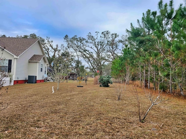 view of yard featuring central AC unit