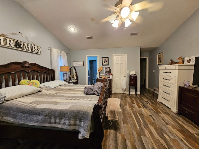 bedroom with ceiling fan, dark hardwood / wood-style floors, and lofted ceiling