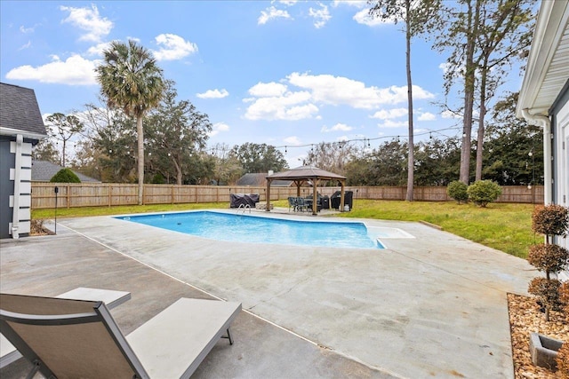 view of pool with a gazebo, a patio, and a lawn