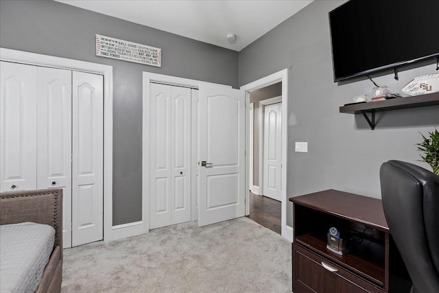 home office featuring light colored carpet