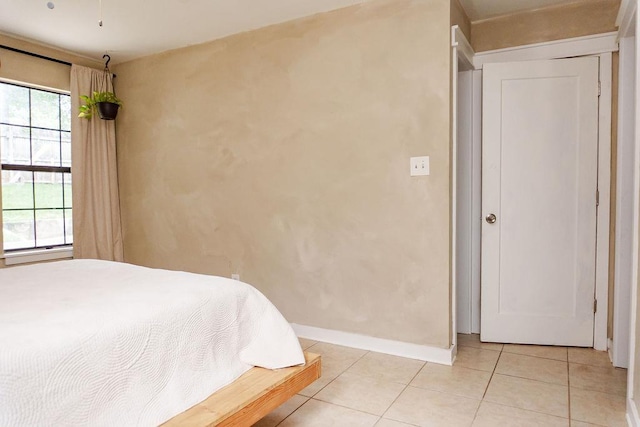 1839 Meriadoc Rd, Tallahassee, FL 32303 - bedroom featuring light tile patterned flooring and baseboards