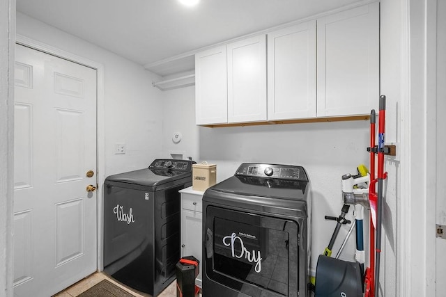 930 Maplewood Ave, Tallahassee, FL 32303 - laundry area with washer and dryer and cabinet space