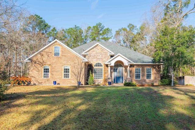 view of front of property with a front lawn