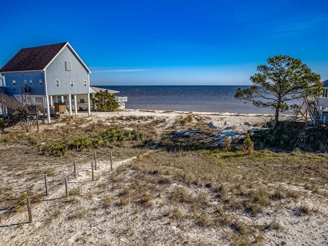 property view of water with a beach view