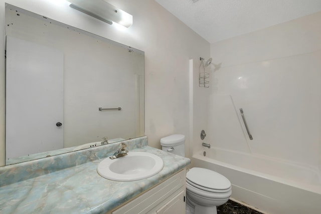 full bathroom featuring a textured ceiling, shower / tub combination, vanity, and toilet