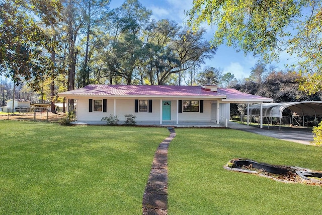 ranch-style house with a carport, a front lawn, and covered porch