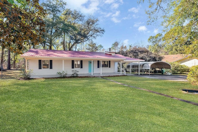 single story home with a carport, a front lawn, and covered porch