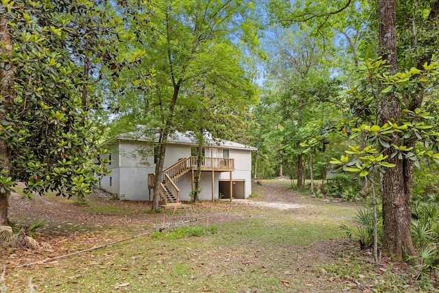 view of yard featuring a deck