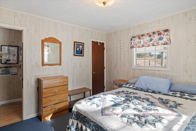 bedroom with ornamental molding