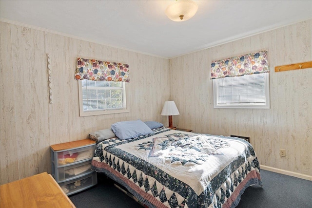 bedroom with carpet floors and ornamental molding