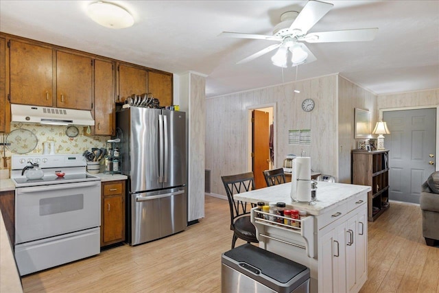 kitchen featuring stainless steel refrigerator, white cabinetry, ceiling fan, white electric range, and light wood-type flooring