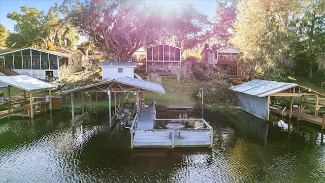 dock area with a water view