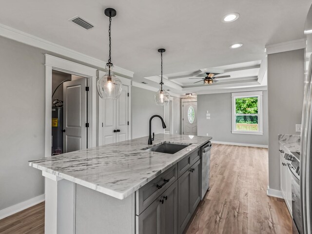 1613 Sea Breeze Way, Carrabelle, FL 32322 - kitchen featuring visible vents, crown molding, stainless steel appliances, a sink, and gray cabinets