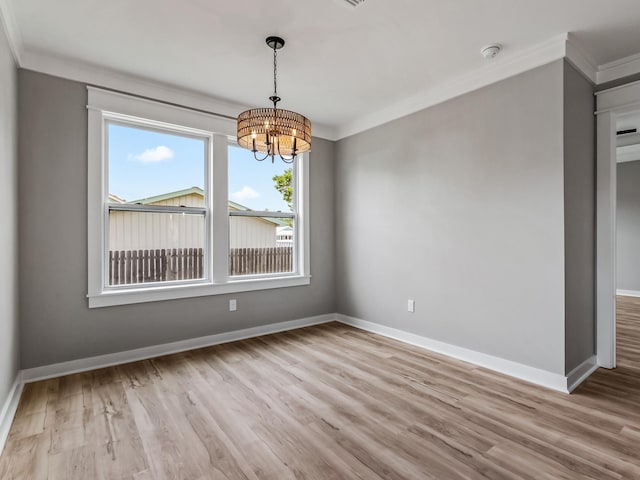 1613 Sea Breeze Way, Carrabelle, FL 32322 - unfurnished dining area with visible vents, crown molding, a chandelier, and wood finished floors