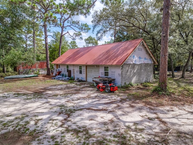 view of outbuilding with a garage