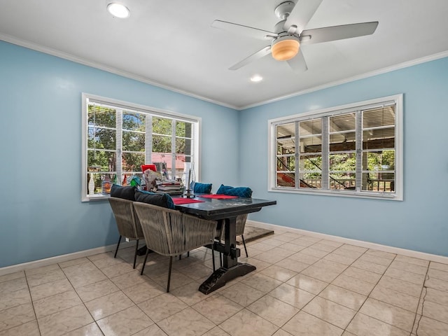 dining area with ceiling fan, crown molding, and light tile patterned flooring