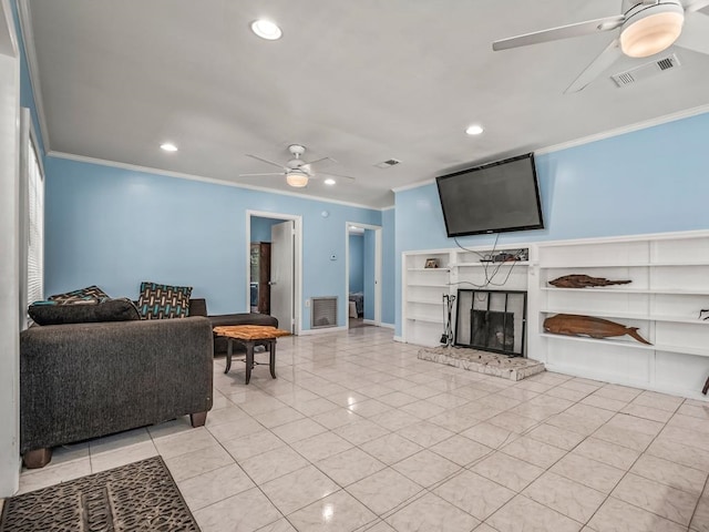 living room featuring light tile patterned floors, ceiling fan, and crown molding