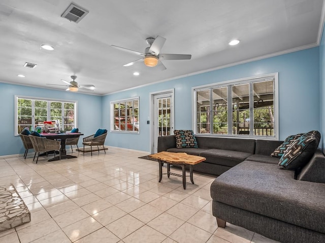 tiled living room featuring ceiling fan and crown molding