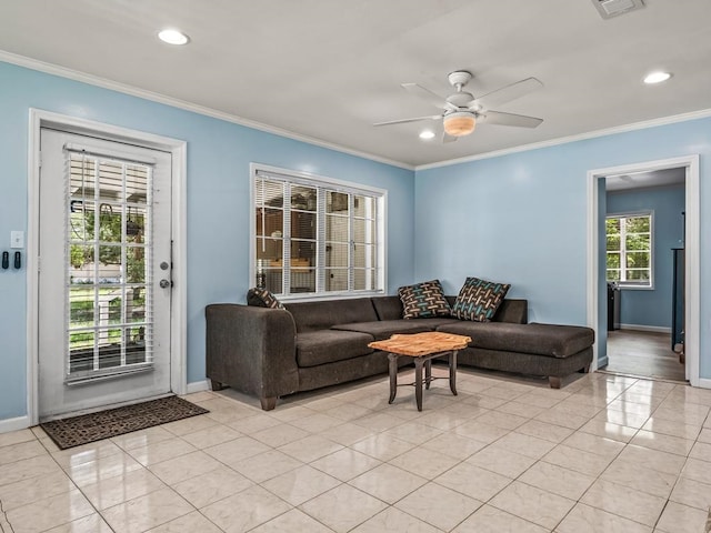 living room featuring ceiling fan, light tile patterned flooring, and crown molding