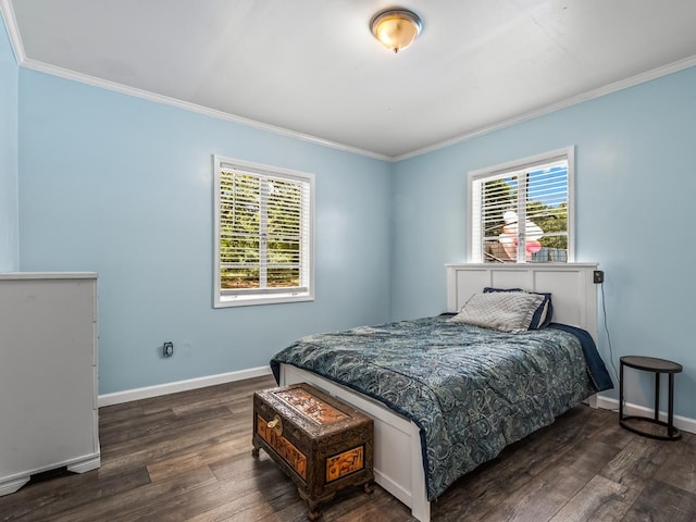 bedroom with dark wood-type flooring and ornamental molding