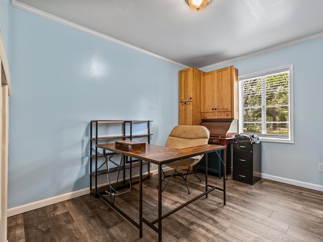 home office with hardwood / wood-style floors and crown molding