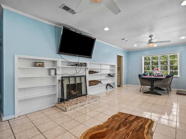 tiled living room featuring ceiling fan and ornamental molding