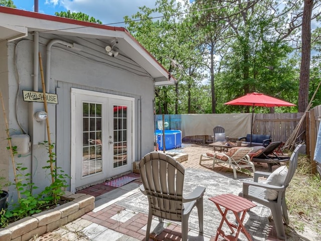 view of patio / terrace featuring french doors