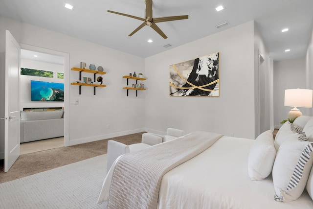 carpeted bedroom with ceiling fan