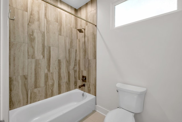 bathroom featuring tile patterned floors, shower / bathing tub combination, and toilet