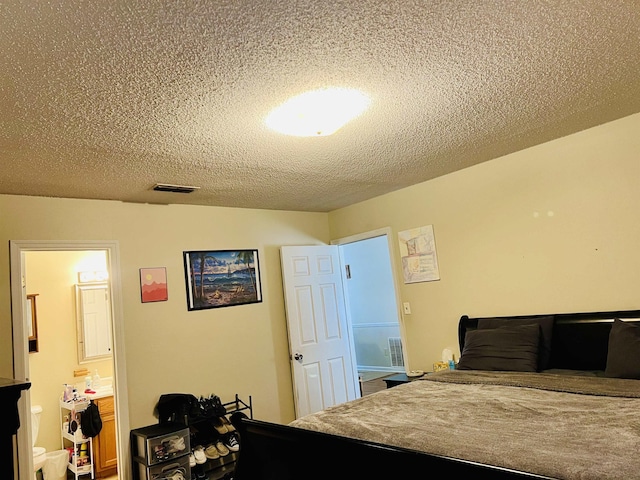 bedroom with a textured ceiling