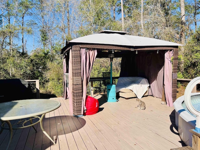 wooden terrace with a gazebo