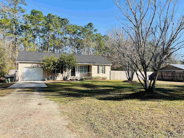 single story home with a garage and a front lawn