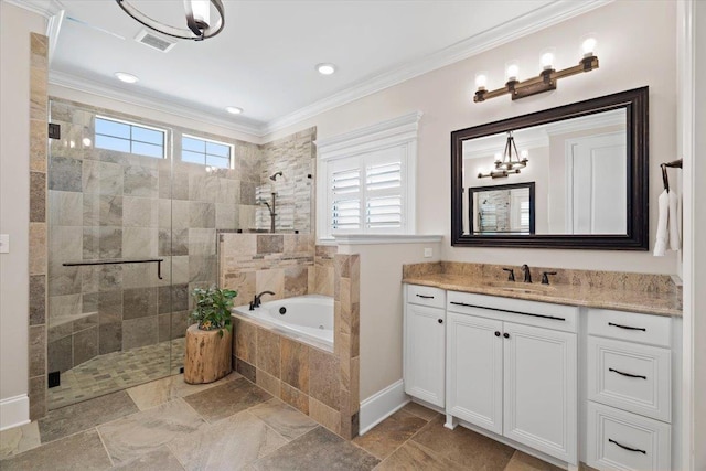 6476 Tracy Ln, Tallahassee, FL 32309 - full bath featuring a garden tub, a shower stall, vanity, ornamental molding, and a chandelier