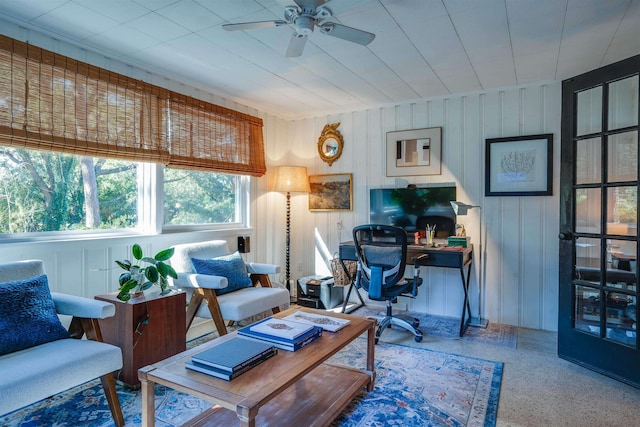 interior space featuring ceiling fan