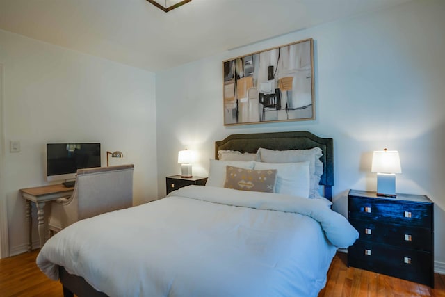 bedroom featuring hardwood / wood-style flooring